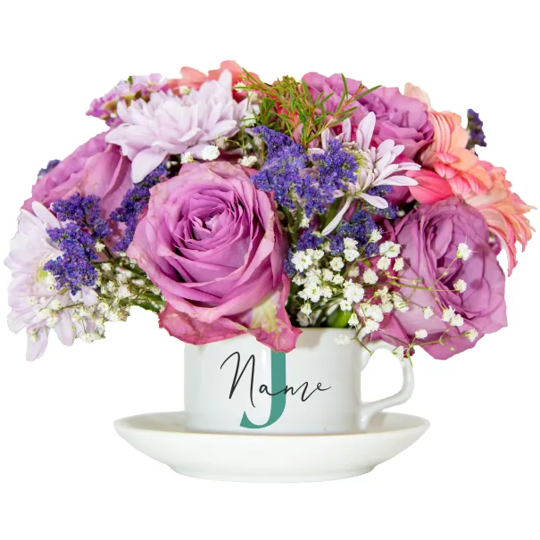 Light Pink Flower Arrangement In Tea Set Product Image